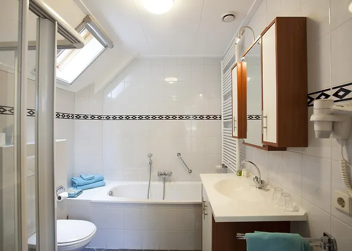 Hotell Logis Hotel De Tuinkamer