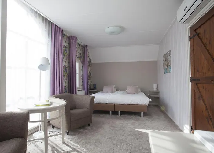 فندق Logis De Tuinkamer 3*